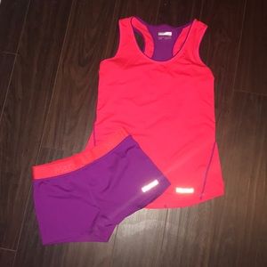 Marmot athletic tank and spandex shorts set.